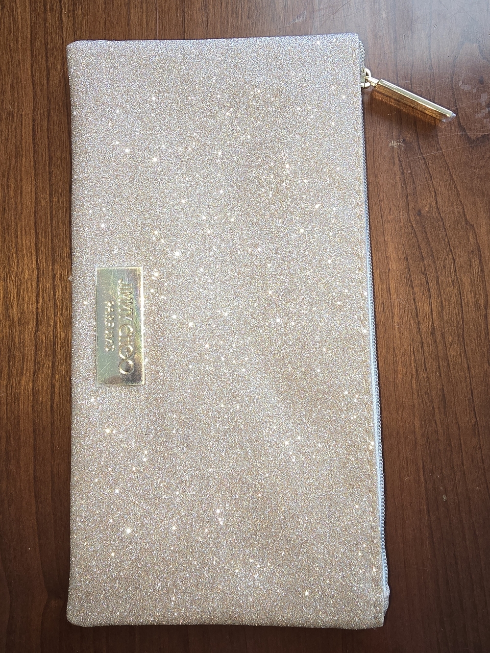 Jimmy Choo Glitter Zip Clutch in Champagne